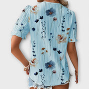 Bruna - Blusa elegante com um decote pontiagudo