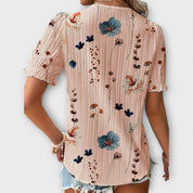 Bruna - Blusa elegante com um decote pontiagudo