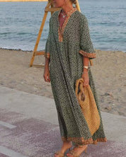 Luna · Vestido maxi de Mulher com estampado com decote em V