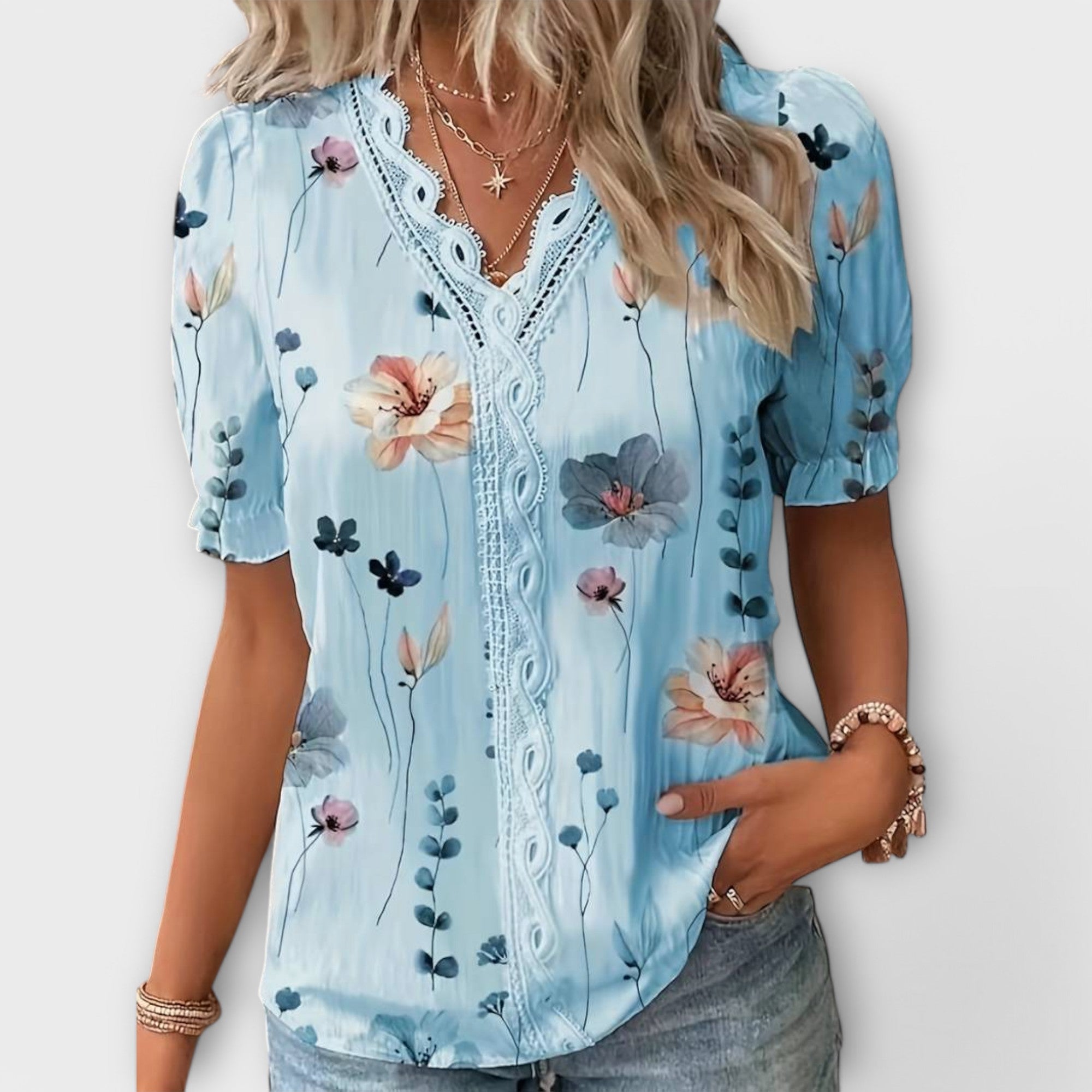Bruna - Blusa elegante com um decote pontiagudo