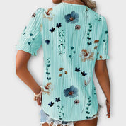 Bruna - Blusa elegante com um decote pontiagudo