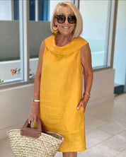 Perla – Vestido tubinho sem mangas com gola redonda