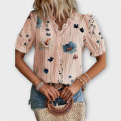 Bruna - Blusa elegante com um decote pontiagudo