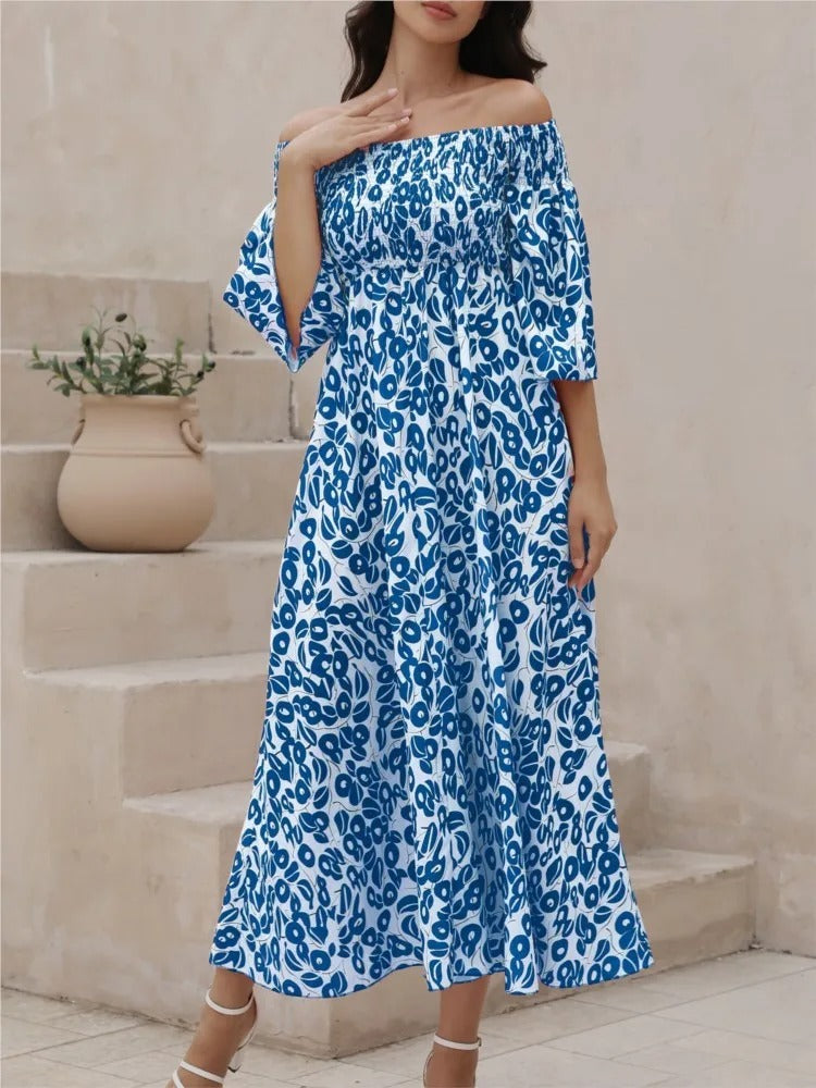 Vestido Maxi com Estampado Floral, Decote Ombros Descobertos e Bolsos